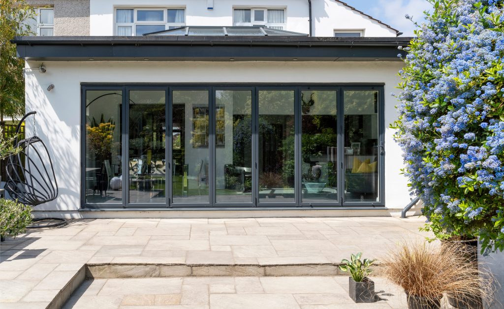 Seven panel black bi-fold door