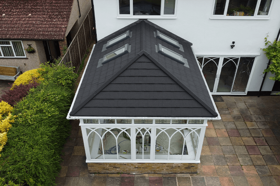 Black tiled solid roof with rooflights