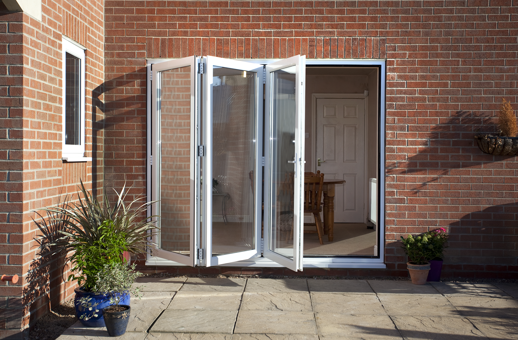 White uPVC bi-folding doors