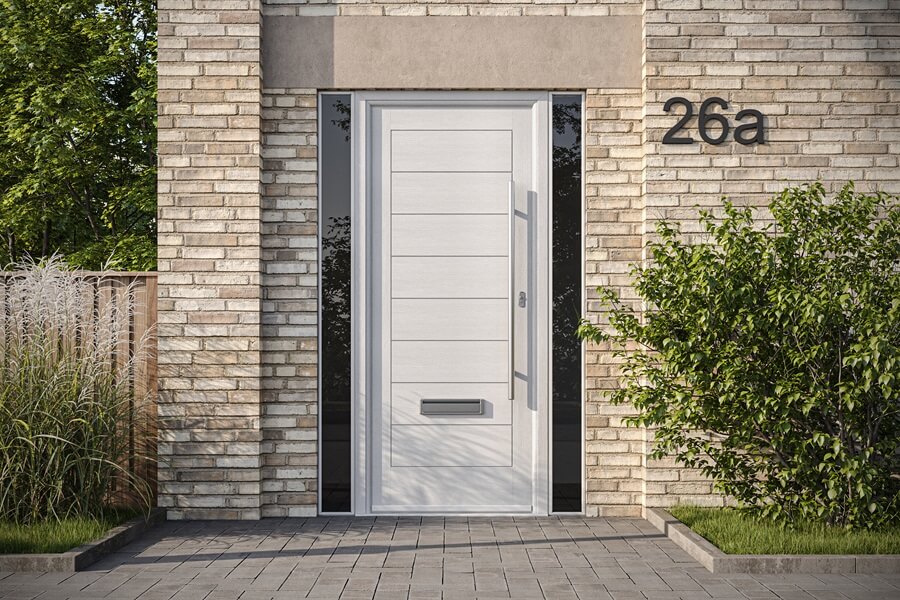 Modern composite front door in Alaskan Birch finish framed by light brickwork and minimalist landscaping.